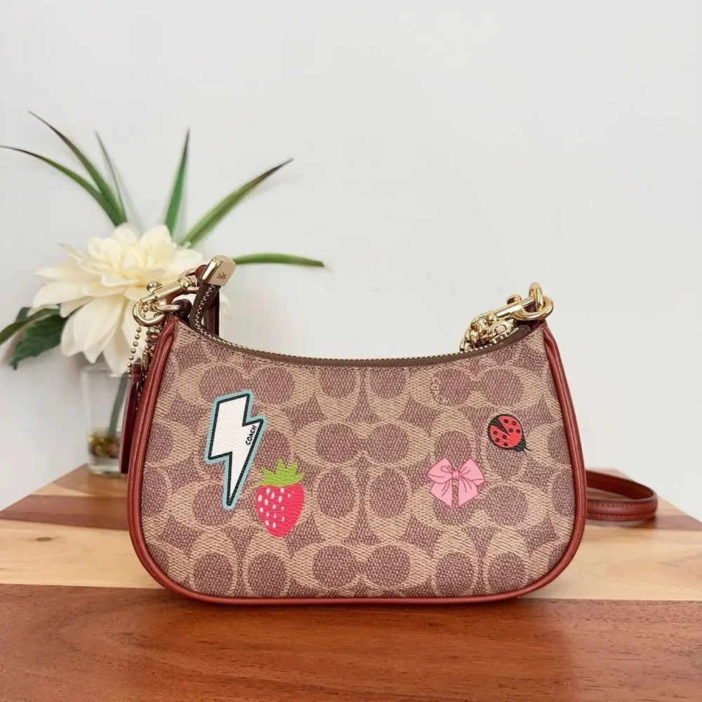 NWT Coach Teri Mini Crossbody‎ Bag In Signature Canvas With Sticker Print